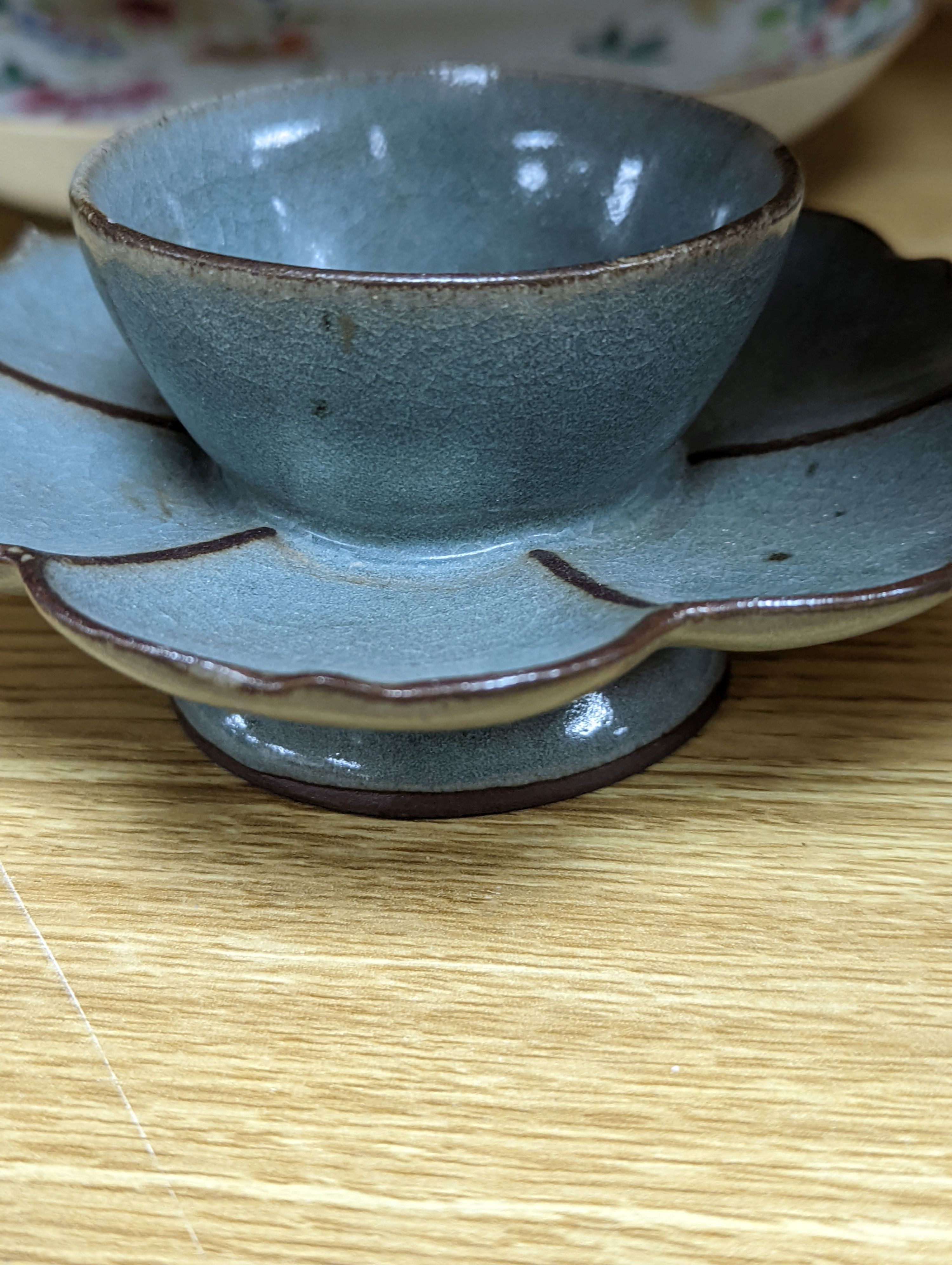 An 18th century Chinese famille rose dish, crackle-glaze stem cup, Beijing glass tea bowl and a Chinese Imari plate. Largest 24cm